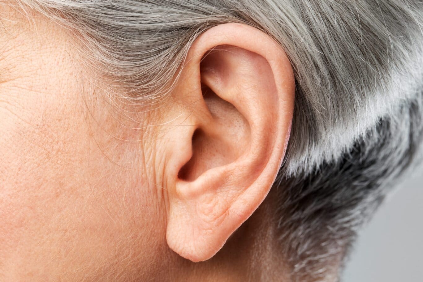 Close-up of elderly person's ear
