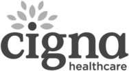 Cigna healthcare logo with stylised grey text and a leaf-like design above the i, representing a trusted specialist in fields such as plastic surgery.